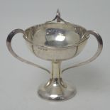 An Edward VII hallmarked silver Art Nouveau stylised footed bowl, height 12cm, Jay,