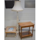 A white painted cast iron standard lamp, a two-tier oak table on barleytwist supports,