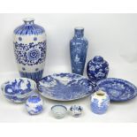 A quantity of blue and white Oriental ceramics to include tea bowls, two vases, a jar and cover etc,