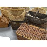 A quantity of wicker baskets, some for use in fishing.