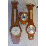 A walnut wall barometer by Short & Mason of London, height 61cm,