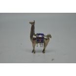 An unusual Continental silver and enamel llama or alpaca, marked '950', height 6cm.