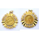 A Victorian old head full sovereign 1889 within 18ct yellow gold floral frame, approx 13.9g.