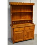 A contemporary pine kitchen dresser,