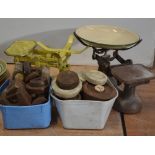 Two pair of vintage scales and a large quantity of weights.