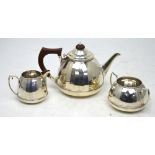 A George VI hallmarked silver three-piece tea service, Barker Brothers Silver Ltd, Birmingham 1938,