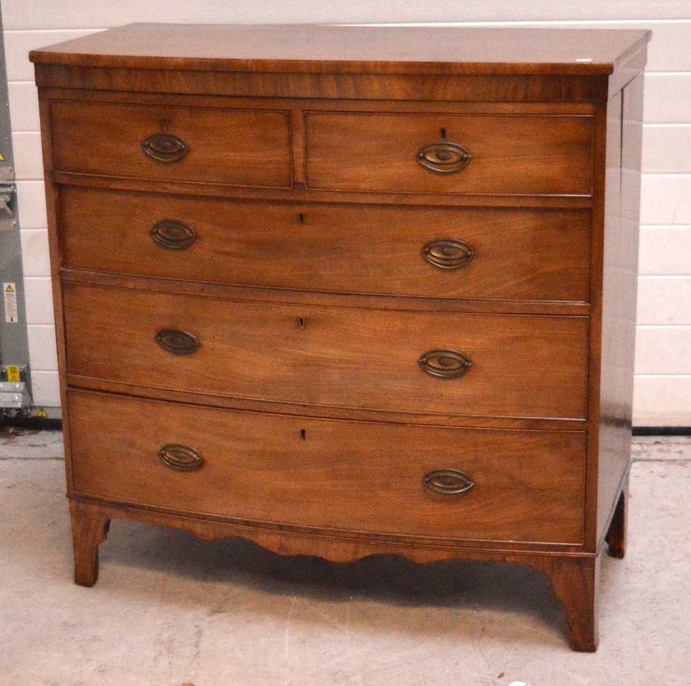 A George IV mahogany bow-front two-over-three chest of drawers on bracket feet, 108 x 106cm.