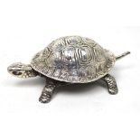 An Edward VII hallmarked silver novelty tortoise table bell, Grey & Co, Birmingham 1907, width 14.