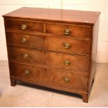 A George IV walnut two-over-three chest of drawers on bracket feet, 100 x 109cm.