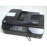 An HP Office Jet 4630 print, fax, scan, copy machine.