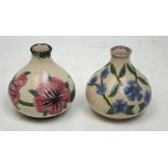 Two similar squat Cobridge vases, each hand painted and salt glazed,