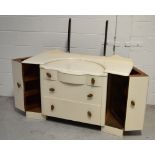 A 1930s mahogany dressing table, painted white,