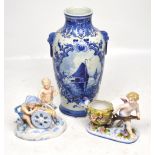 A Delft blue and white baluster vase decorated with sailing ships and two late 19th century