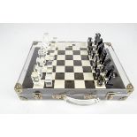 A French Dapy Luicite chess set with board, boxed.