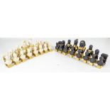 A Franklin Mint black basalt and porcelain Egyptian Tutankhamun chess set with gilt highlights,