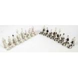 A set of 20th century Czech Republic porcelain chess pieces by C Mielon, height of king 7.5cm.