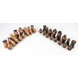 A set of 20th century ceramic Viking chess pieces, in brown and fawn, height of king 11cm.