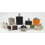 A collection of various pewter and stainless steel hip flasks to include leather covered examples