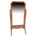 A mahogany swing frame cheval mirror, 117 x 66cm, on stand.