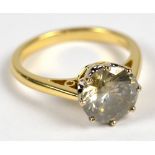 A 18ct yellow gold brilliant cut diamond solitaire ring, the stone approx. 3.