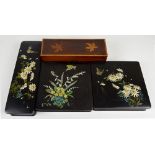 Two papier-mâché handkerchief boxes with removable lids decorated with flowers, birds,