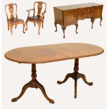 A burr walnut double pedestal carved dining table,