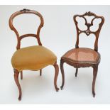 A late 19th century cane seated bedroom chair with scroll decorated back and cabriole front legs,