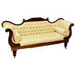 A Victorian mahogany double scroll ended settee with button upholstered back,