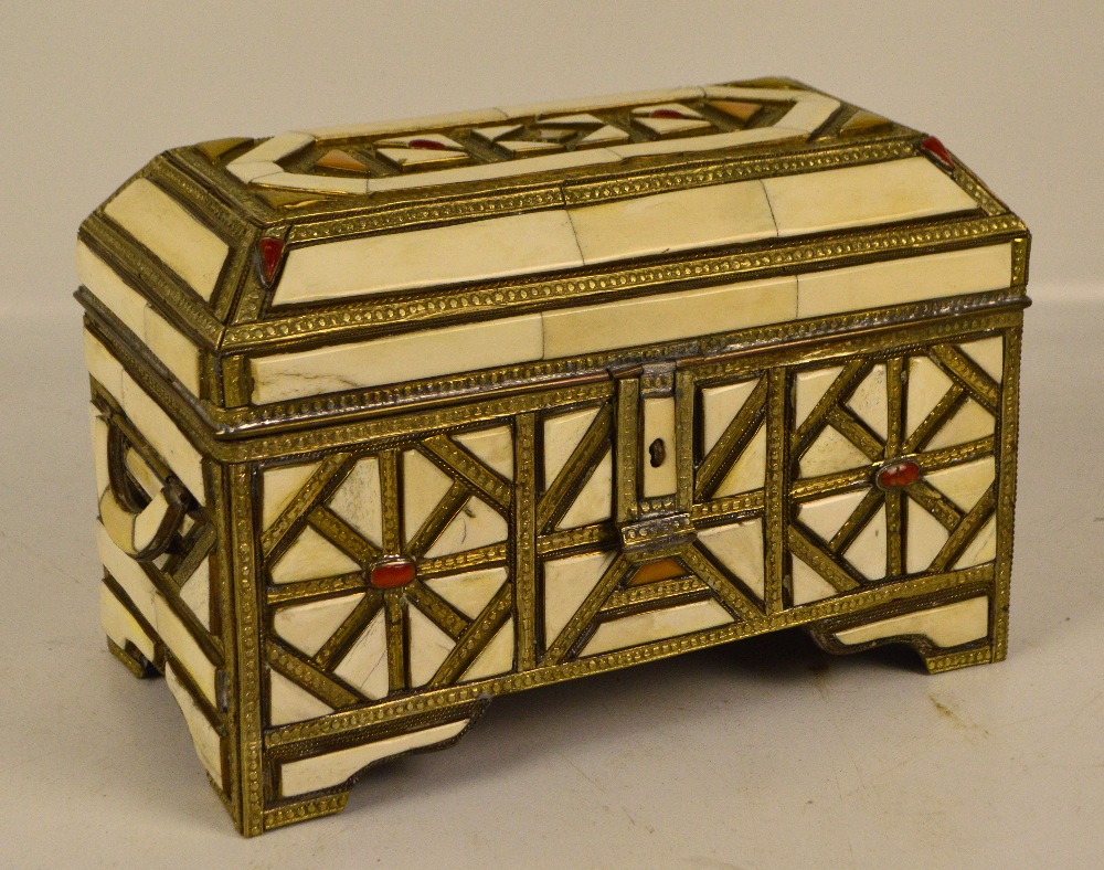 A Moroccan bone panel and glass decorated base metal twin handled casket,