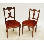 A harlequin set of eight Edwardian stained beech dining chairs with padded stuff-over seats and