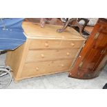 An early 20th century pine chest of drawers with curved corners, two short over two long drawers,