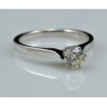 An 18ct white gold diamond solitaire ring, the stone approx 0.