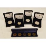 Three cased silver proof £5 coins including 2010 Restoration of The Monarchy and 2008 Queen