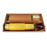 A mahogany cased Stanley "Fuller Calculator", with brown bakelite mounts and handle,