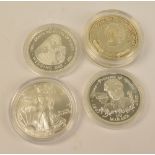 A mint American 1ozt fine silver $1 coin, 2006 and three Princess Diana commemorative coins (4).