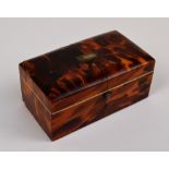 A late 19th/early 20th century tortoiseshell and ivory detailed trinket box with hinged lid centred