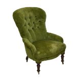 A reproduction button upholstered armchair on turned supports.