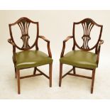 A pair of mahogany Hepplewhite style open arm elbow chairs.