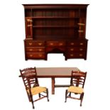 A reproduction hardwood dining suite, comprising refectory table,