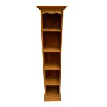 A modern thin pine open bookcase, width 43cm, height 182cm.