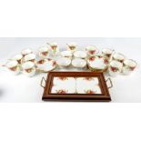 A quantity of Royal Albert "Old Country Roses" including six mugs, large teacups and saucers,