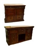A 20th century carved oak buffet with two central drawers above an alcove,