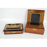 A late Victorian mahogany writing slope with inset brass vacant cartouche to the lid enclosing