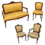 A French walnut framed canapé/salon settee, a matching elbow chair and two side chairs (4).
