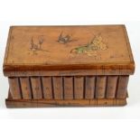 An olive wood Sorrento type trinket box in the form of a stack of books decorated to the hinged lid