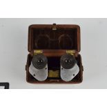 A teak cased pair of C.P. Goerz of Berlin Trieder 9x binoculars, stamped "R.37" (af).