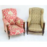 An early Victorian mahogany long seat arm wing backed armchair with turned pillars to turned legs,