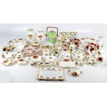 A large quantity of Royal Albert "Old Country Roses" decorative items including mantel clocks,