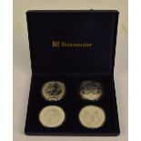 A cased set of four silver mint coins; 1998 Britannia, Canada's 1998 silver maple leaf,