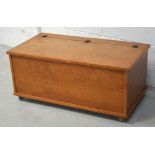 A contemporary pine blanket box on castors, length approx 104cm.
